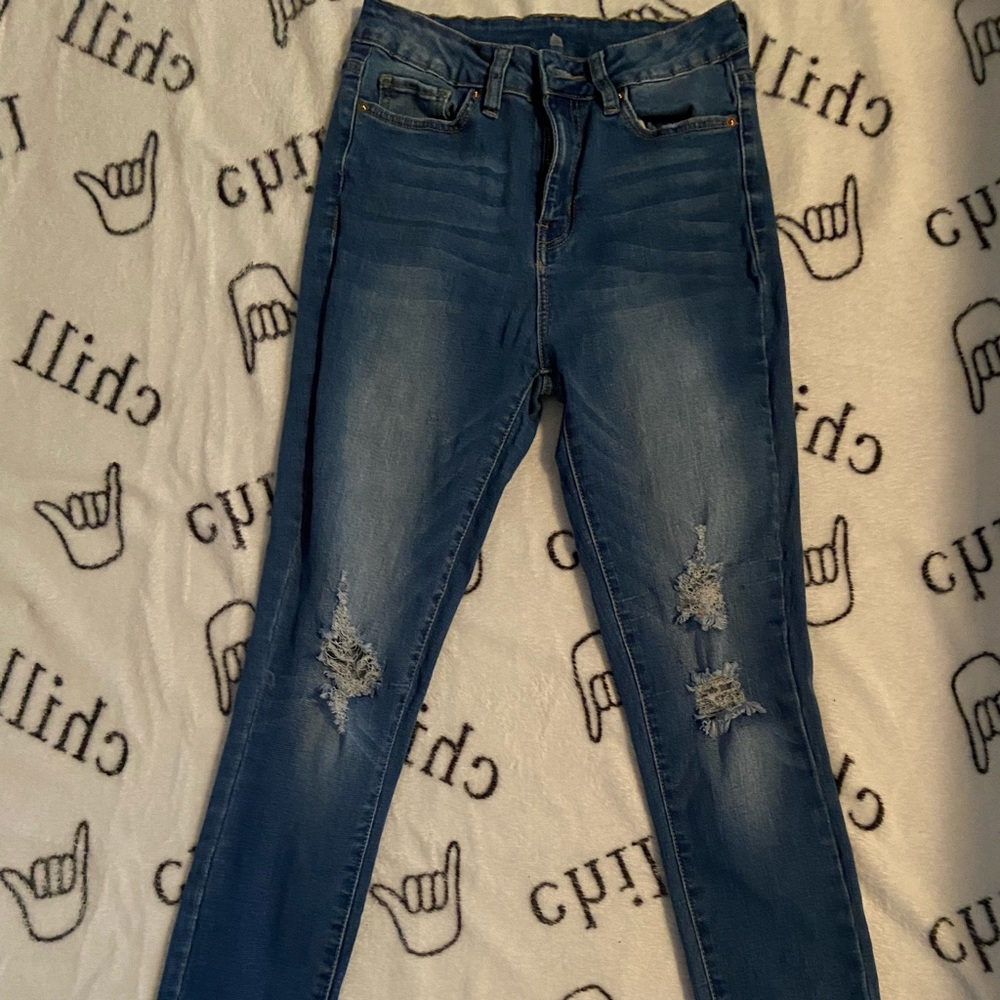 Ripped blue jeans
